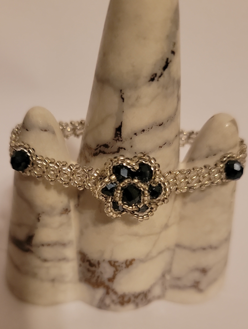 Silver-Tone Bracelet with royal blue Faceted Flower Accents